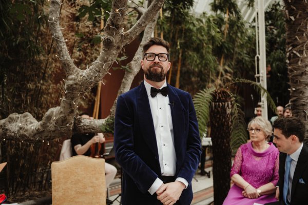 Groom waits for bride at alter