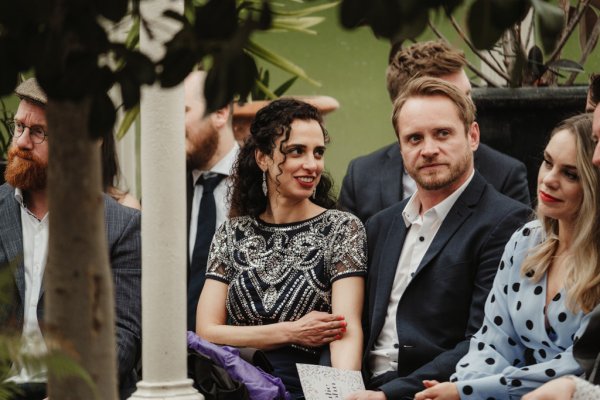 Male and female in audience guests