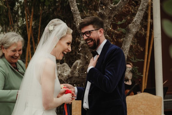 Bride and groom laughing