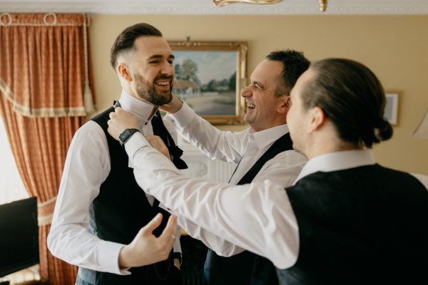 Groom and groomsmen getting ready