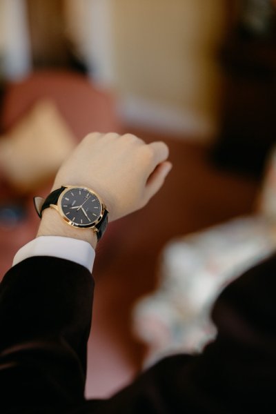 Watch detail on groom