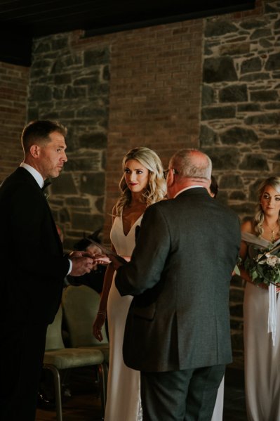 Bride groom father and bridesmaid