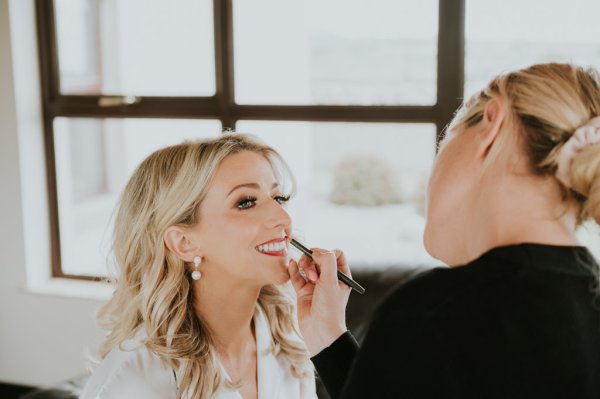 Bride getting makeup done MUA