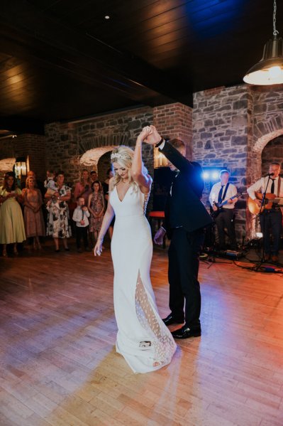 Bride and groom dancing on the dancefloor