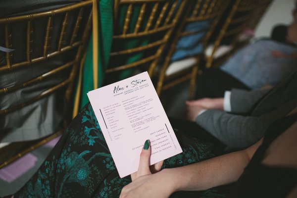 Guest holds wedding pamphlet