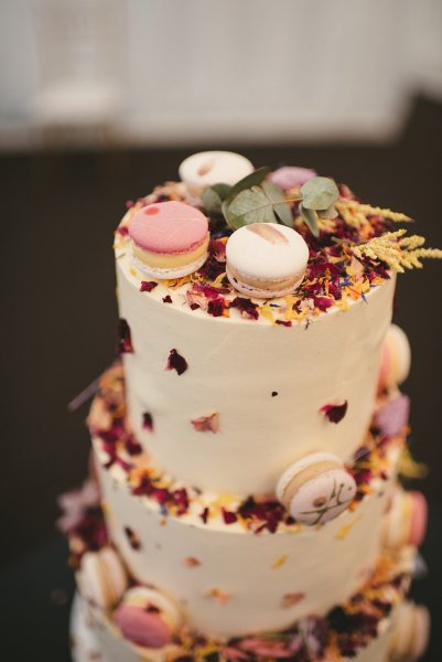 Macaroons in cream white floral flower cake