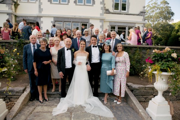 Group photo of family guests bride groom father and mother