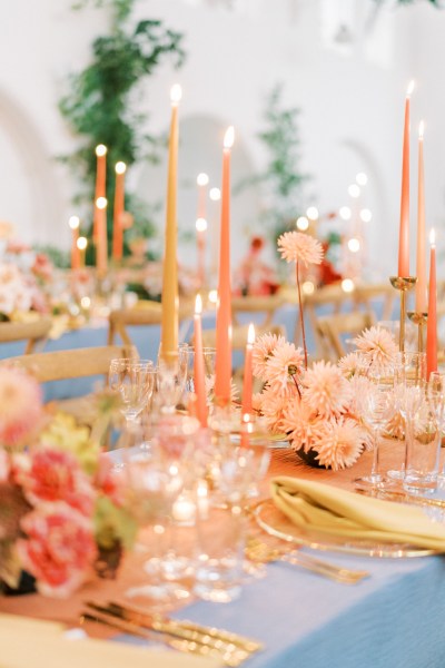 Empty interior room setting candles lit table and chairs pink vibe cutlery