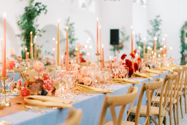 Empty interior room setting candles lit table and chairs pink vibe cutlery