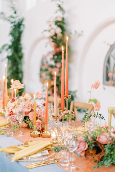 Empty interior room setting candles lit table and chairs pink vibe