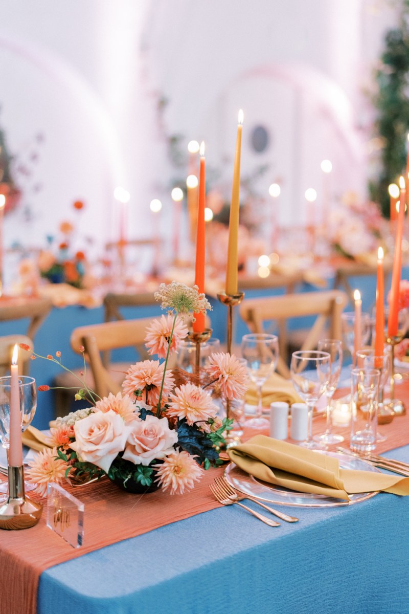 Empty interior room setting candles lit table and chairs pink vibe