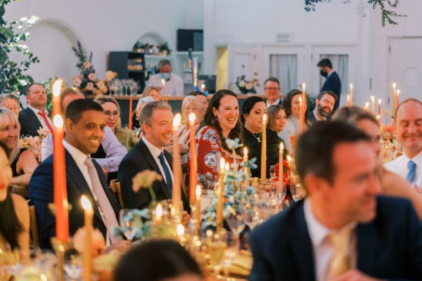 Guests during speeches dining room table