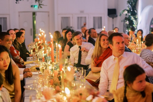 Guests during speeches dining room table