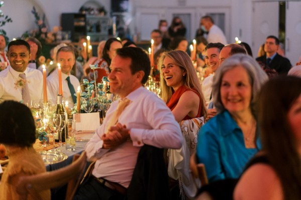 Guests during speeches dining room table