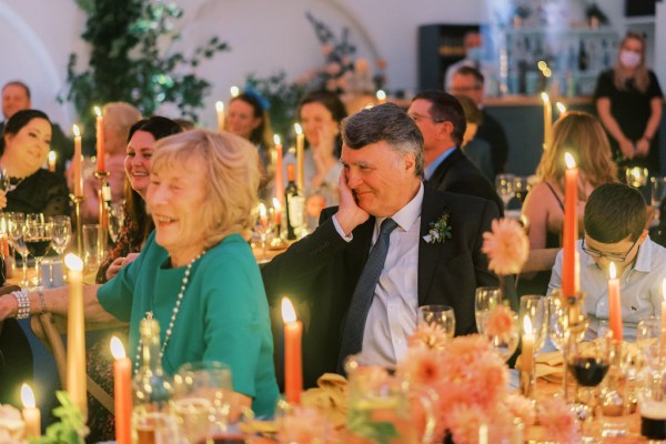 Guests mother and father during speeches dining room table