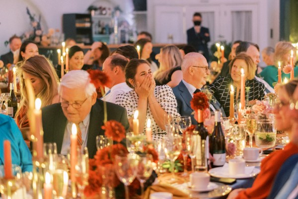 Guests seated laughing audience