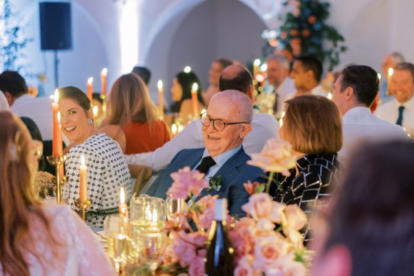 Guests seated laughing audience