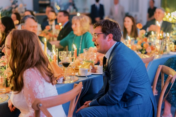 Guests seated laughing audience