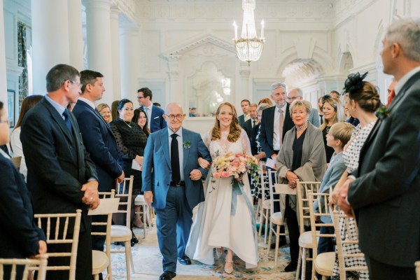 Father of the bride walks down the aisle