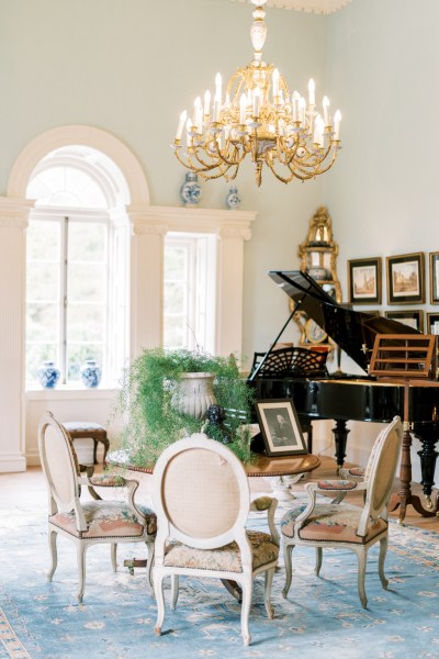 Piano forte black instrument music room Victorian manor house setting