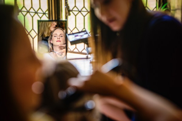 Bride getting her makeup done