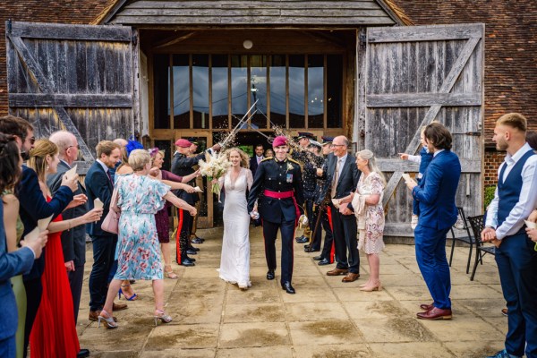 Swords over couples heads bride and groom and guests