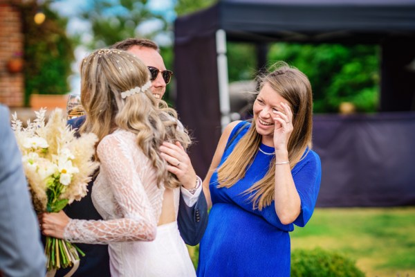 Women bride laughing guests