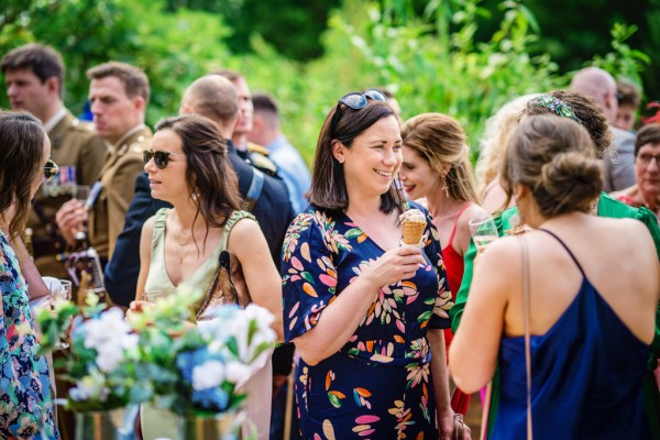 Atmosphere shot of guests eating ice cream and laughing