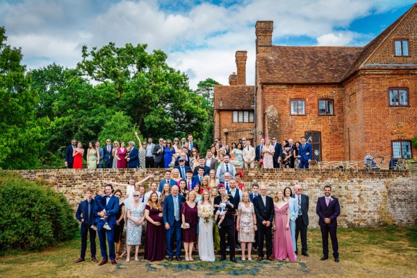 Group photo exterior wedding venue family friends