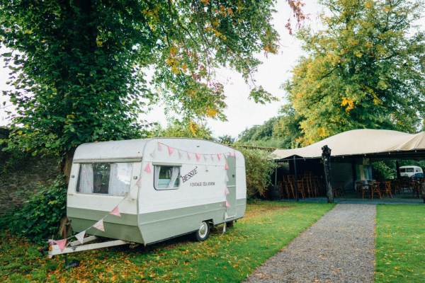 Wedding exterior detail garden and caravan