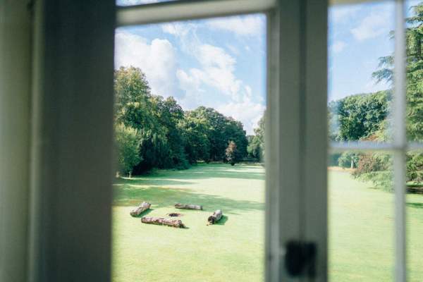 Interior shot of exterior sunny garden window shot