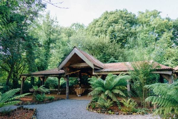 Exterior barn wedding venue garden forest setting