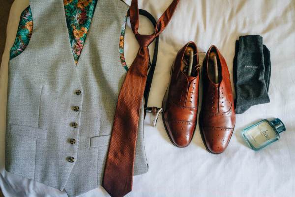 Brown brogues shoes and tie suit detail aftershave and socks