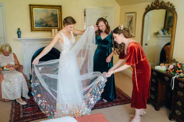 Bottom of dress colourful detail bridesmaids and bride get ready