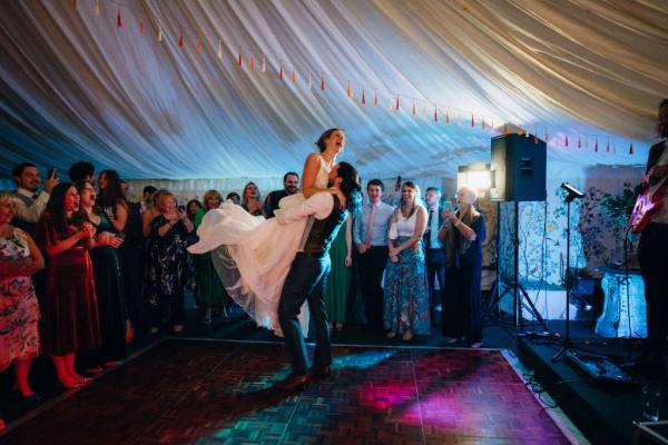 Bride and groom dancing on the dancefloor