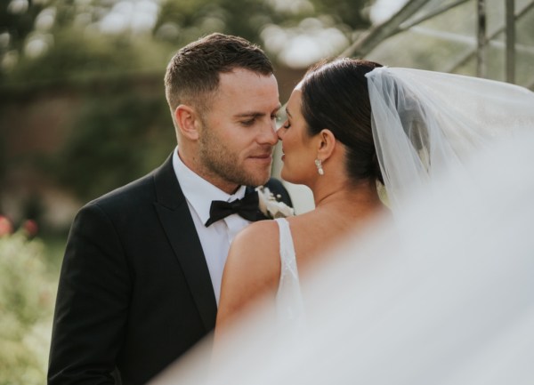 Bride and groom looking at each other