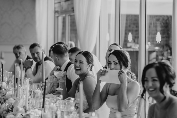 Black and white bride laughing