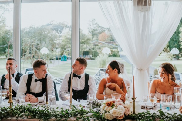 Bride groom at table in dining room