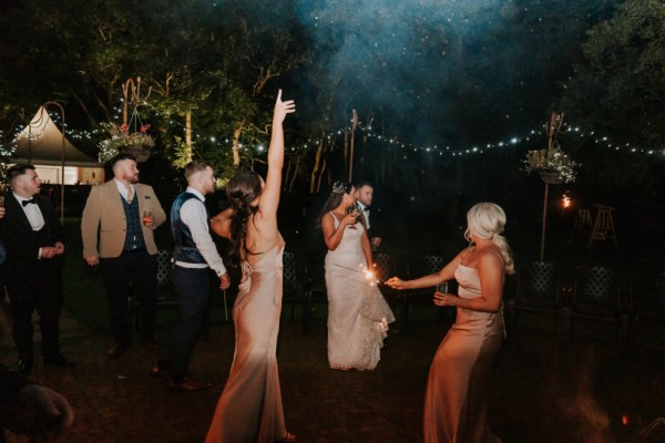 Bride dancing with bridesmaids