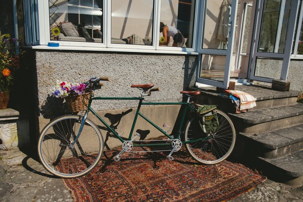 Bicycle bike with basket filled with flowers detail