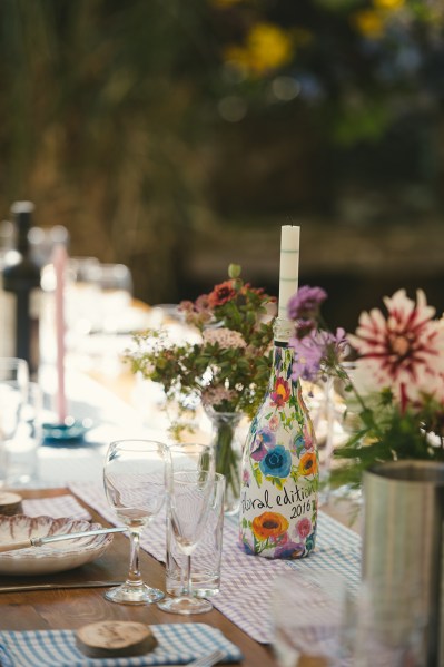 Flower detail wine bottle on table decor