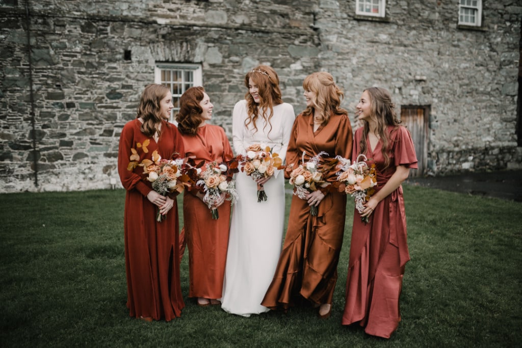 Real Bridesmaids who wore mix and match bridesmaids dresses | orange bridesmaid dresses