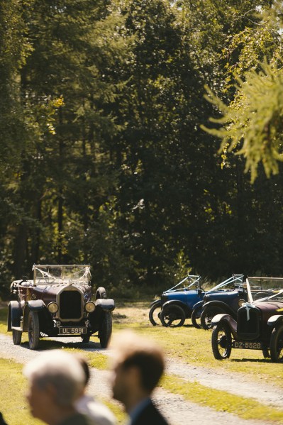 Wedding cars with ribbon on them