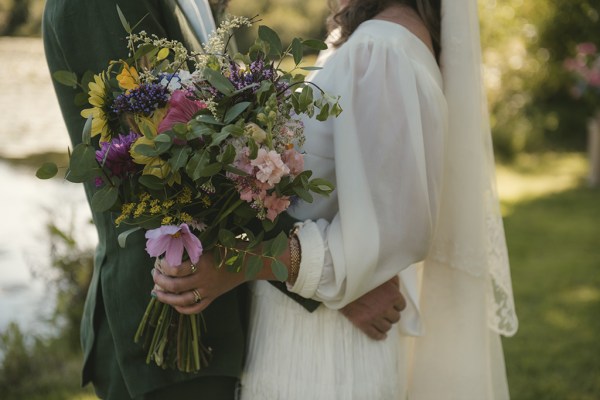 Bride holding bouquet of flowers