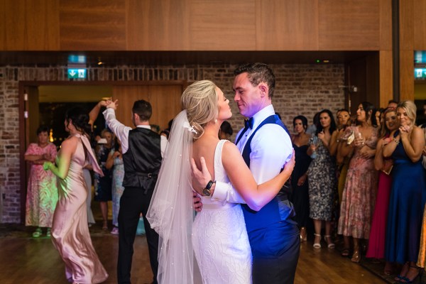 Bride and groom first dance on the dancefloor