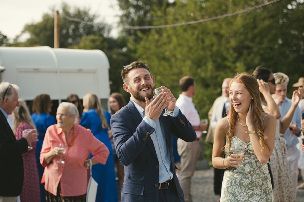 Man clapping guests