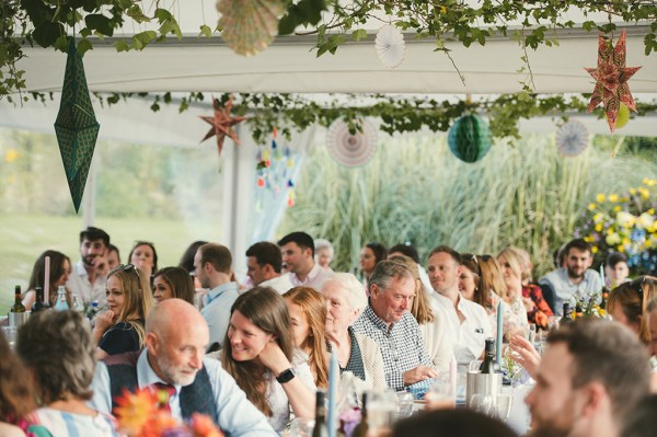 Marquee and guests during speeches table setting