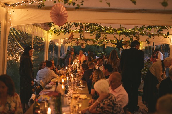 Tent and guests setting a nighttime