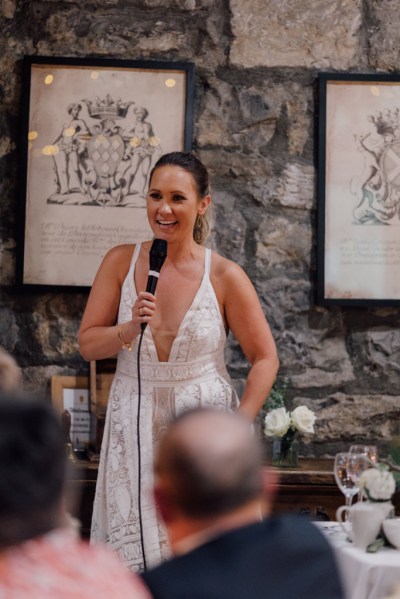 Bride holding microphone giving speech