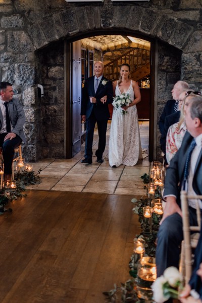 Father of the bride walks down the aisle